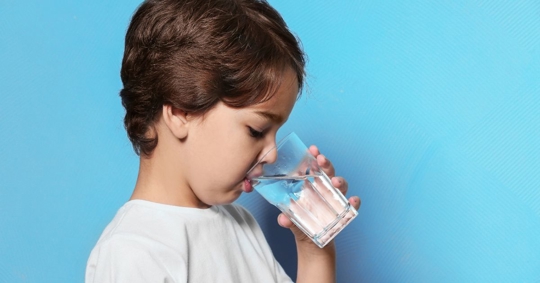 child drinking water
